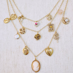 Vintage Rose Charm Layered Necklace – Romantic Multi-Strand Chain with Antique-Inspired Cameo Details
