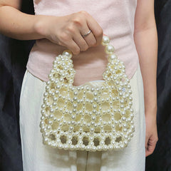 High Sense Minority Simple Elegant Hollow Out Cutout Handmade Beaded Dumpling Bag Retro Woven Handbag