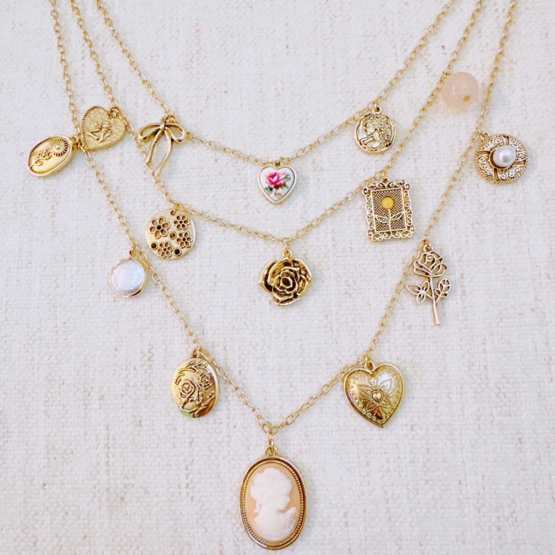Vintage Rose Charm Layered Necklace – Romantic Multi-Strand Chain with Antique-Inspired Cameo Details